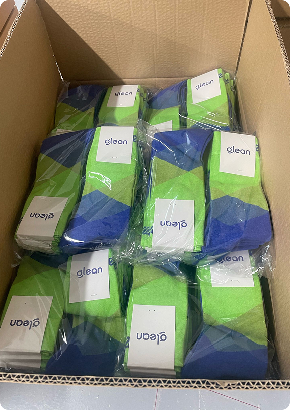 Team holding branded socks